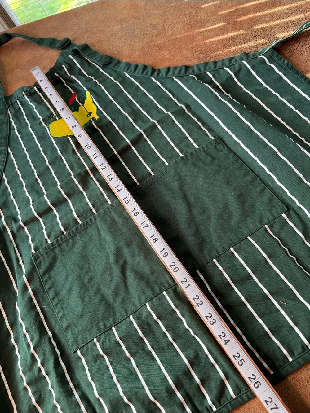 Masters Golf Dark Green Pinstripe Apron with Yellow & Red Golf Emblem
